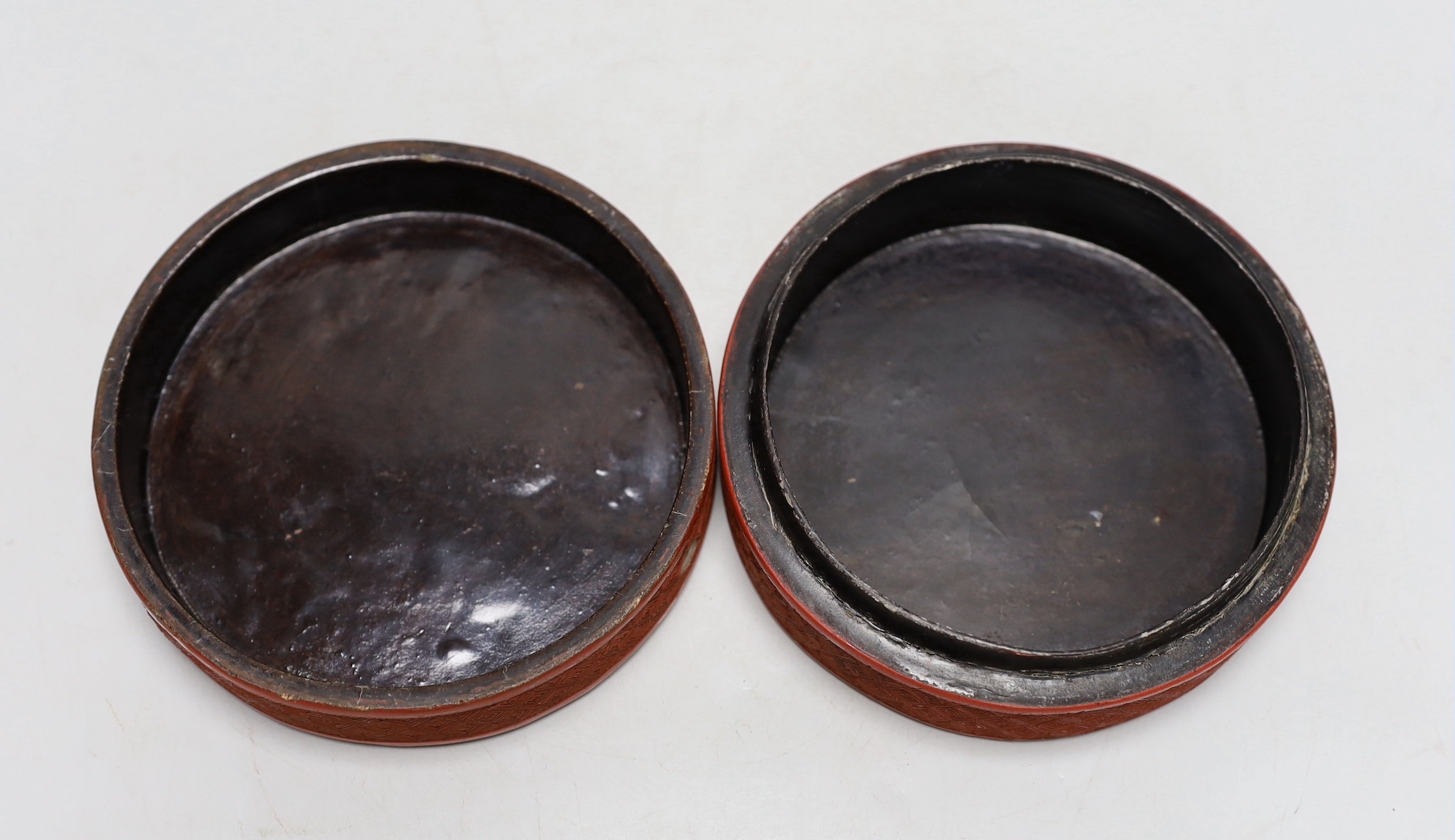 A 19th century Chinese cinnabar lacquer box and cover, 13cm diameter